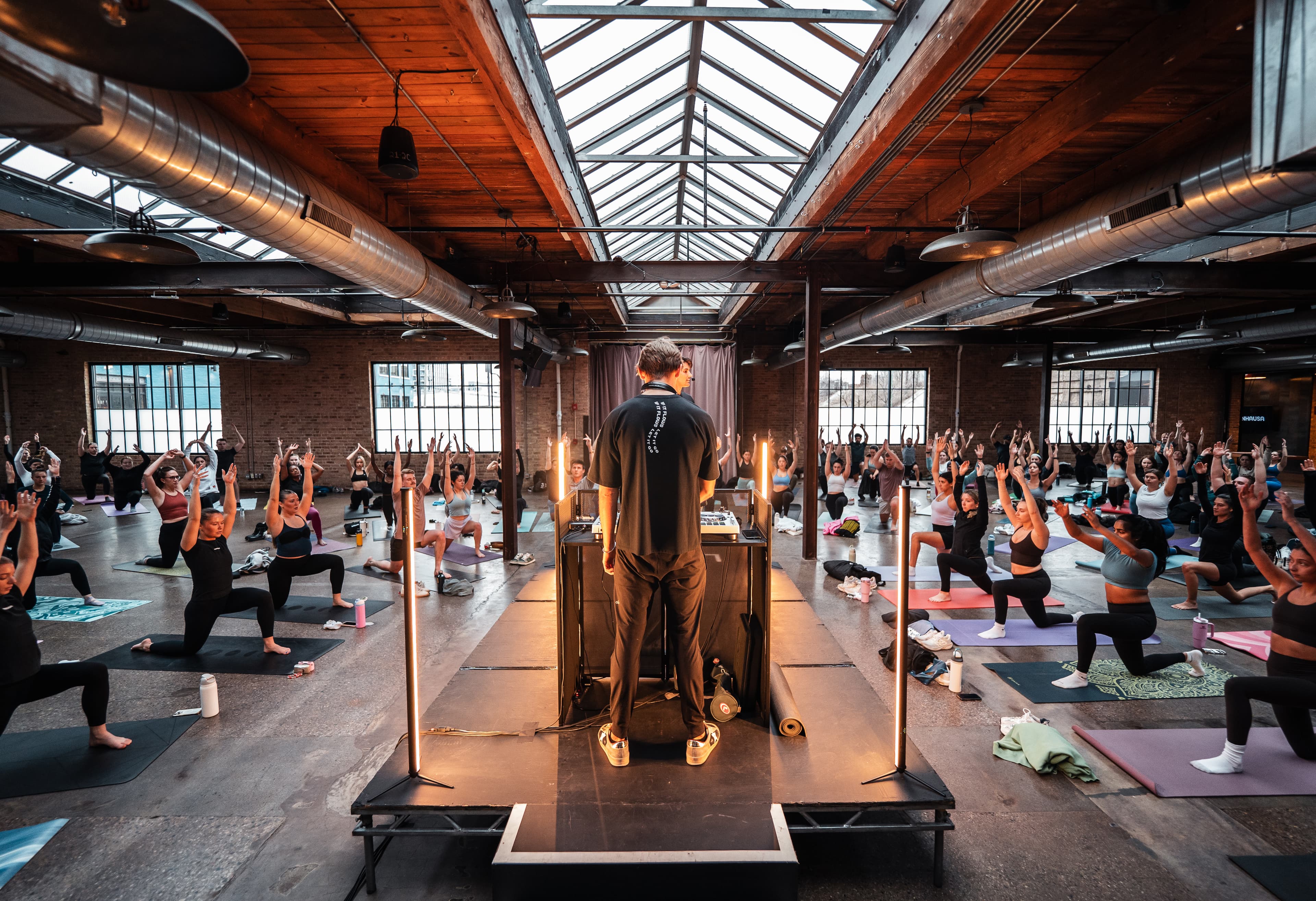Yoga class in a beautiful studio with natural lighting